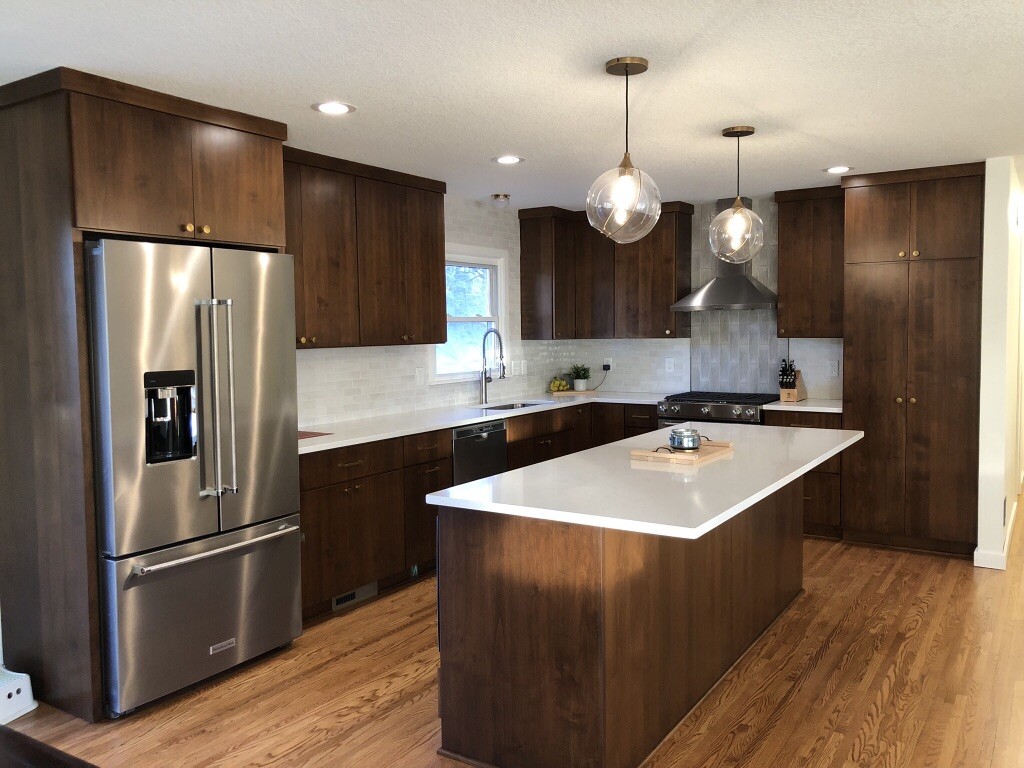 Dark wood custom remodeled kitchen by Executive Remodeling